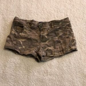 Miley Cyrus camo shorts